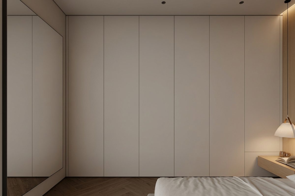 Placard a medida con frentes lisos y espejo integrado en dormitorio